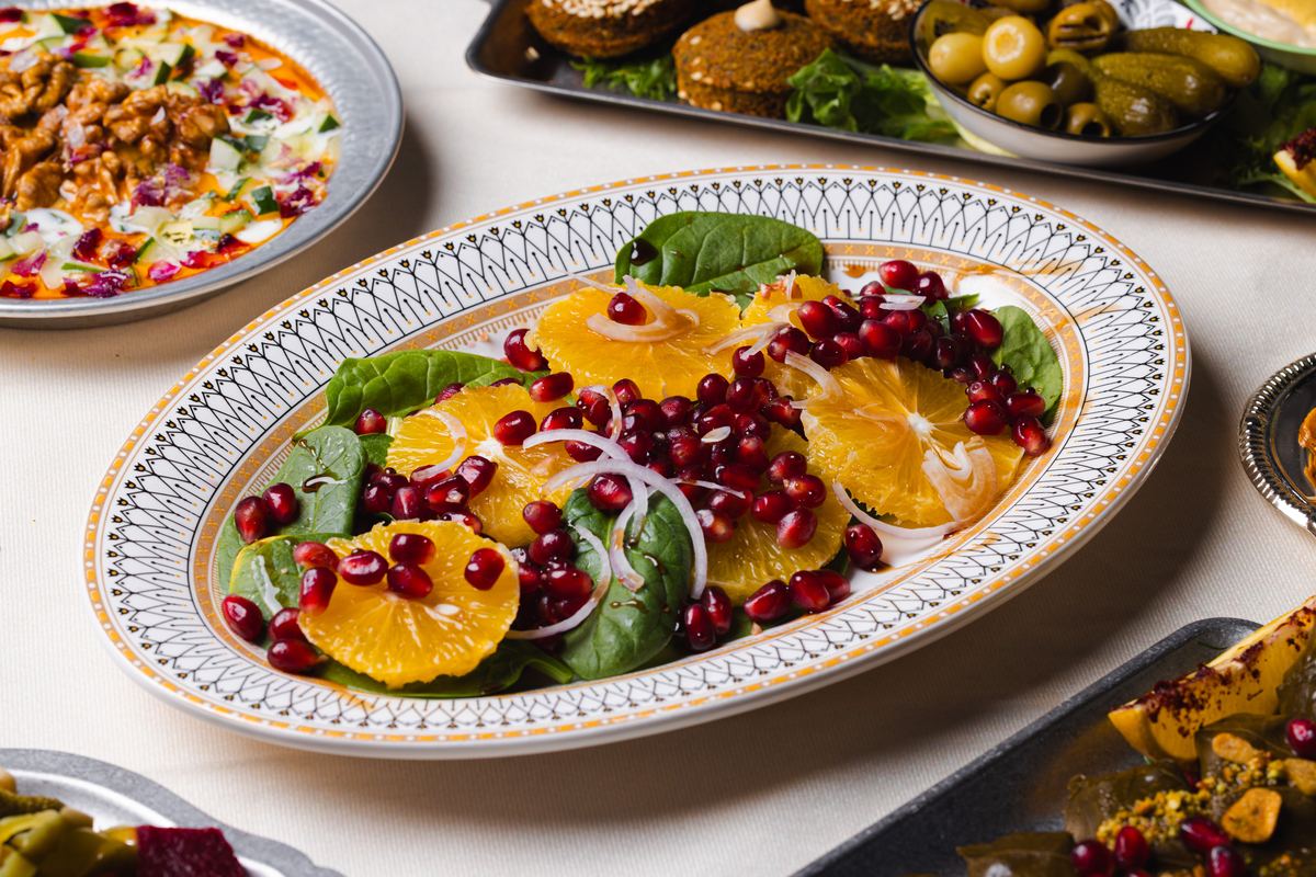 Salad Anar: pomegranate, spinach and orange with house dressing