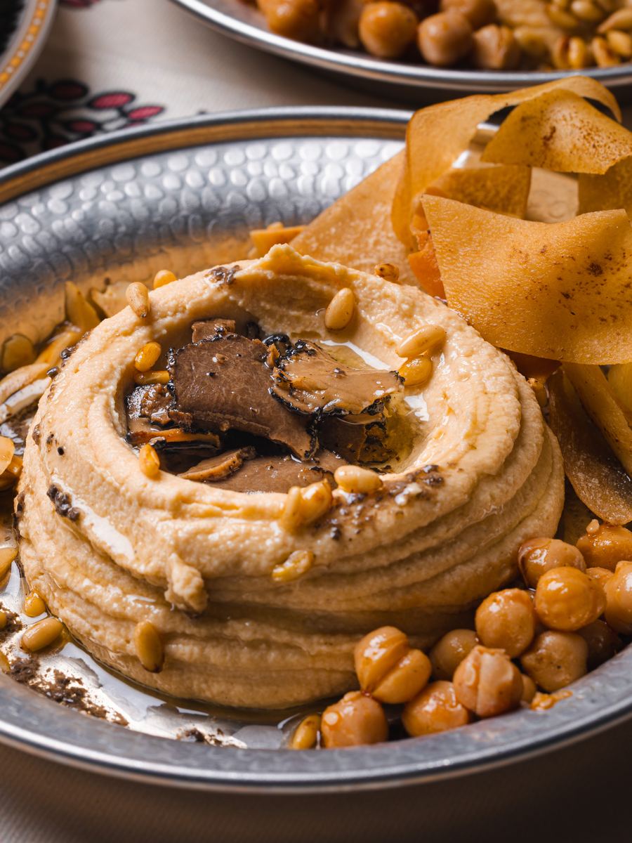 Truffle hummus at Shirazi, finished with shaved black truffle, pine nuts and crisp pita