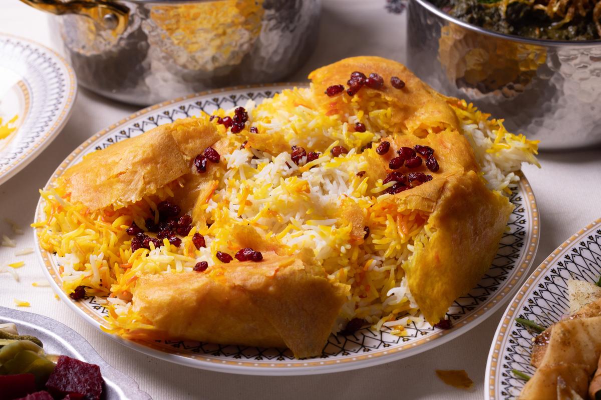 Tahchin: golden saffron rice cake with barberries