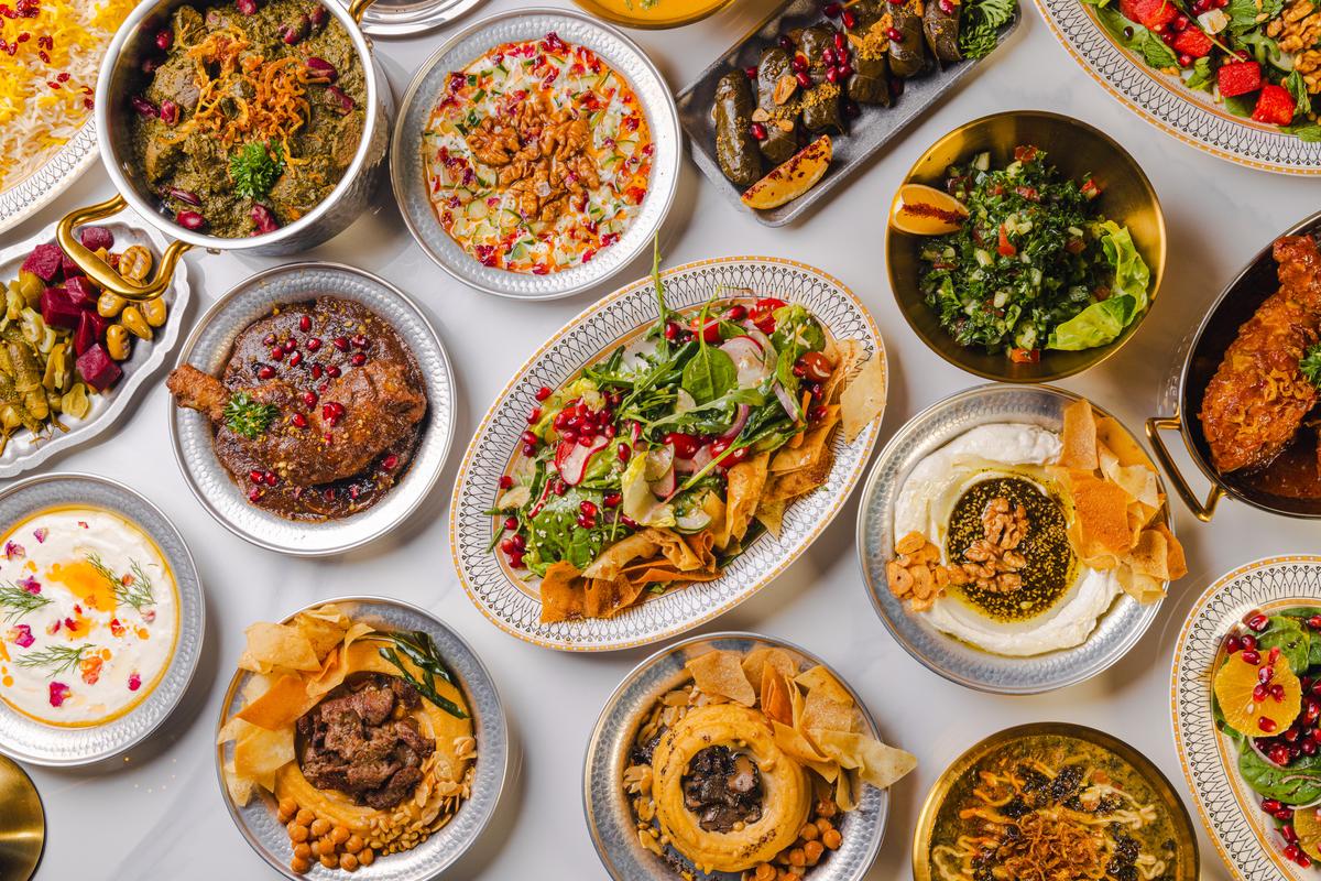 The full table from above, edge to edge with mezze