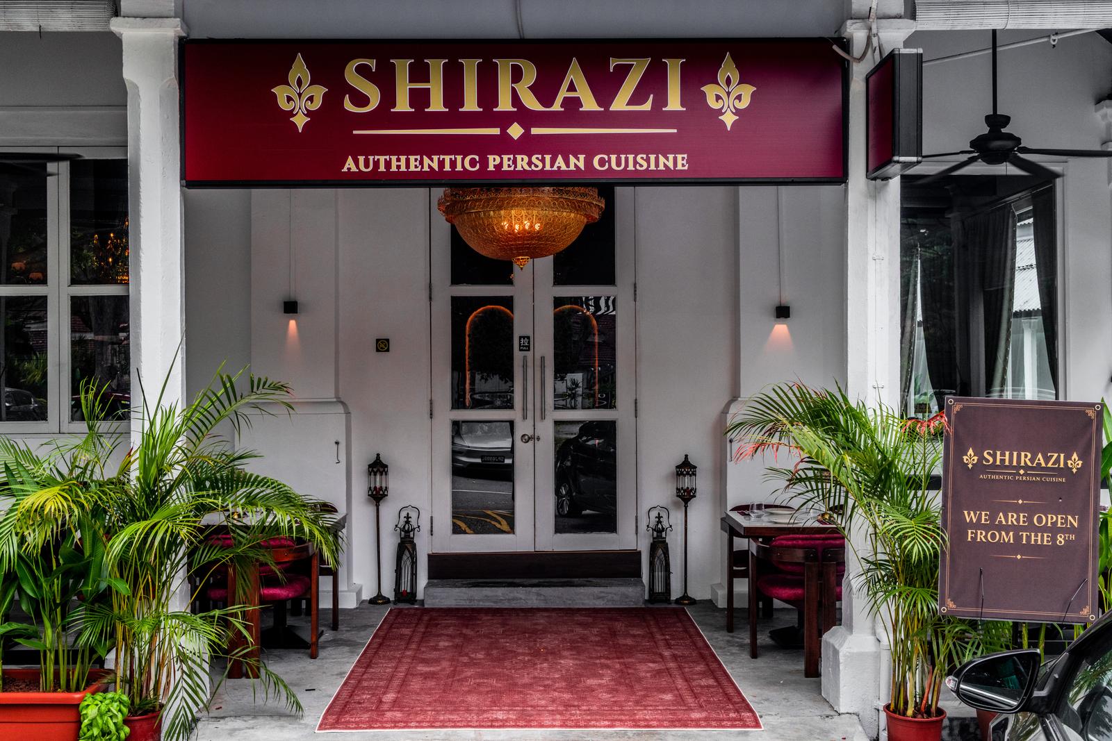 Shirazi at 8 Dempsey Road: burgundy awning and the red entrance carpet